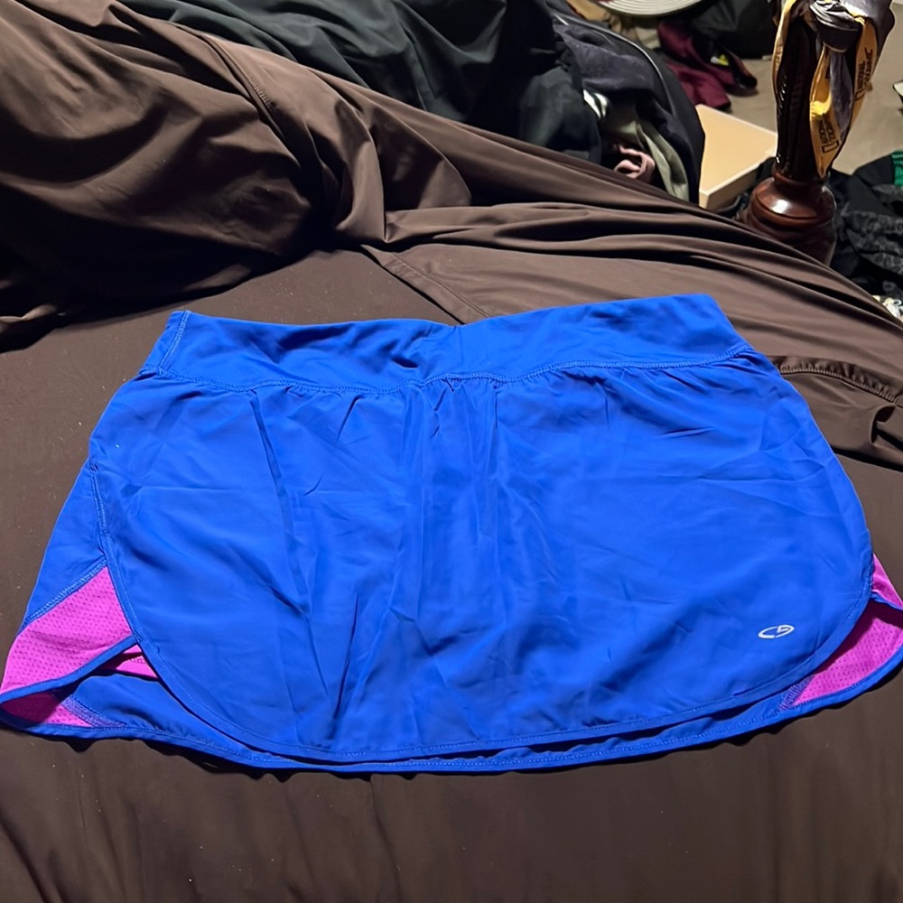 Never worn champion althetic skirt with built in shorts